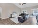 Spacious living room with leather couches and hardwood floors at 3328 Waterloo Ter, North Port, FL 34286