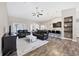 Open concept living room and kitchen with hardwood floors at 3328 Waterloo Ter, North Port, FL 34286