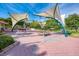 Picnic tables under shade sails at 3695 Shamrock Dr, Venice, FL 34293