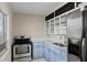 Galley kitchen with stainless steel appliances at 370 Waltham St, Port Charlotte, FL 33952