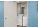 Stackable washer and dryer in a dedicated laundry room at 370 Waltham St, Port Charlotte, FL 33952