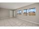 Living area with tile floors and neutral walls at 370 Waltham St, Port Charlotte, FL 33952