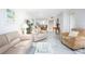 Spacious living room with light colored furniture at 404 Cerromar N Cir # 116, Venice, FL 34293