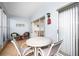 Cozy screened patio with seating area at 404 Cerromar N Cir # 116, Venice, FL 34293