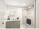 Modern bathroom with a walk-in shower and updated vanity at 4110 Central Sarasota Pkwy # 127, Sarasota, FL 34238
