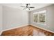 Bright bedroom with hardwood floors and large window at 4110 Central Sarasota Pkwy # 127, Sarasota, FL 34238