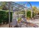 Relaxing hot tub with pergola and lounge chairs at 4110 Central Sarasota Pkwy # 127, Sarasota, FL 34238