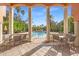 Relaxing pool area with patio furniture and seating at 4110 Central Sarasota Pkwy # 127, Sarasota, FL 34238