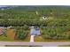 Wide aerial view of canal-front home and surroundings at 419 Ramblewood St, Port Charlotte, FL 33953
