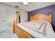 Main bedroom with king-size bed and wood furniture at 419 Ramblewood St, Port Charlotte, FL 33953