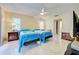 Two twin beds in a well-lit bedroom with tile floors at 419 Ramblewood St, Port Charlotte, FL 33953