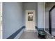 Front entrance with a glass-paneled door at 419 Ramblewood St, Port Charlotte, FL 33953
