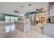 Spacious kitchen with an island, stainless steel appliances, and tile floors at 419 Ramblewood St, Port Charlotte, FL 33953