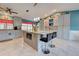 Modern kitchen with gray cabinets and an island at 419 Ramblewood St, Port Charlotte, FL 33953
