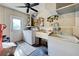 Bright laundry room with washer, dryer and storage at 419 Ramblewood St, Port Charlotte, FL 33953