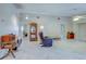 Bright living room with tile floors and comfortable seating at 419 Ramblewood St, Port Charlotte, FL 33953