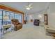 Open living room with tile floors and access to patio at 419 Ramblewood St, Port Charlotte, FL 33953