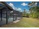 Screened-in pool area with canal views at 419 Ramblewood St, Port Charlotte, FL 33953
