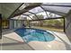 Enjoy this relaxing pool and patio area at 419 Ramblewood St, Port Charlotte, FL 33953
