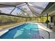 Screened pool and patio with access to the house at 419 Ramblewood St, Port Charlotte, FL 33953