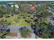 Aerial view of a park with palm trees and walking paths at 509 W Venice Ave # 109, Venice, FL 34285