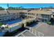 Aerial view showcasing the property's pool and building layout at 509 W Venice Ave # 109, Venice, FL 34285