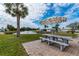 Enjoy the peaceful pond view from this community patio at 555 Circlewood Dr # T10, Venice, FL 34293