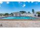 Refreshing community pool with ample deck space at 555 Circlewood Dr # T10, Venice, FL 34293