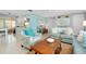 Open living area with coastal decor and comfy seating at 555 Circlewood Dr # T10, Venice, FL 34293