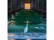 White bird under pier at sunset over ocean at 555 Circlewood Dr # T10, Venice, FL 34293