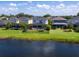 Aerial view of homes and lakefront community at 5930 Anise Dr, Sarasota, FL 34238