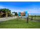 Beach access sign and pathway leading to Siesta Beach at 5930 Anise Dr, Sarasota, FL 34238