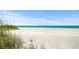 White sand beach with turquoise water at 5930 Anise Dr, Sarasota, FL 34238