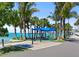 Relaxing beachfront park with palm trees and exercise equipment at 5930 Anise Dr, Sarasota, FL 34238