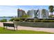 Park with dolphin fountain and bench overlooking the bay at 5930 Anise Dr, Sarasota, FL 34238