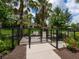 Gated pet park with grassy area and water access for pets at 5930 Anise Dr, Sarasota, FL 34238