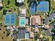 Aerial view of community pool and tennis courts at 612 Bird Bay S Dr # 309, Venice, FL 34285