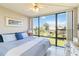 Bedroom with a view and a queen-size bed at 612 Bird Bay S Dr # 309, Venice, FL 34285