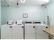 Convenient on-site laundry facility with multiple washers and dryers at 612 Bird Bay S Dr # 309, Venice, FL 34285