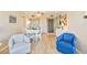 Spacious living area with seating and a dining table at 612 Bird Bay S Dr # 309, Venice, FL 34285