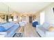Spacious living room showcasing light flooring and comfortable seating at 612 Bird Bay S Dr # 309, Venice, FL 34285