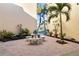 Inviting courtyard patio with seating area, perfect for relaxing at 612 Bird Bay S Dr # 309, Venice, FL 34285
