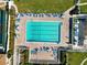 Community pool with plenty of lounge chairs at 612 Bird Bay S Dr # 309, Venice, FL 34285