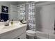 Guest bathroom with shower and nautical theme at 624 Silk Oak Dr, Venice, FL 34293