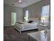 Spacious bedroom with ensuite bathroom access at 624 Silk Oak Dr, Venice, FL 34293