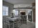 Kitchen features a breakfast bar and stainless steel appliances at 624 Silk Oak Dr, Venice, FL 34293