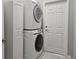 Bright laundry room with Samsung washer and dryer, plus extra storage at 624 Silk Oak Dr, Venice, FL 34293
