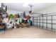 Two-car garage with ample storage shelving at 655 Crossfield Cir # 7, Venice, FL 34293