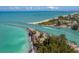 Captivating aerial shot of a waterfront community, highlighting the property's access to water and recreational activities at 705 Armada N Rd, Venice, FL 34285