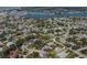 Expansive aerial view of a coastal neighborhood with the home conveniently located near waterways and community amenities at 705 Armada N Rd, Venice, FL 34285